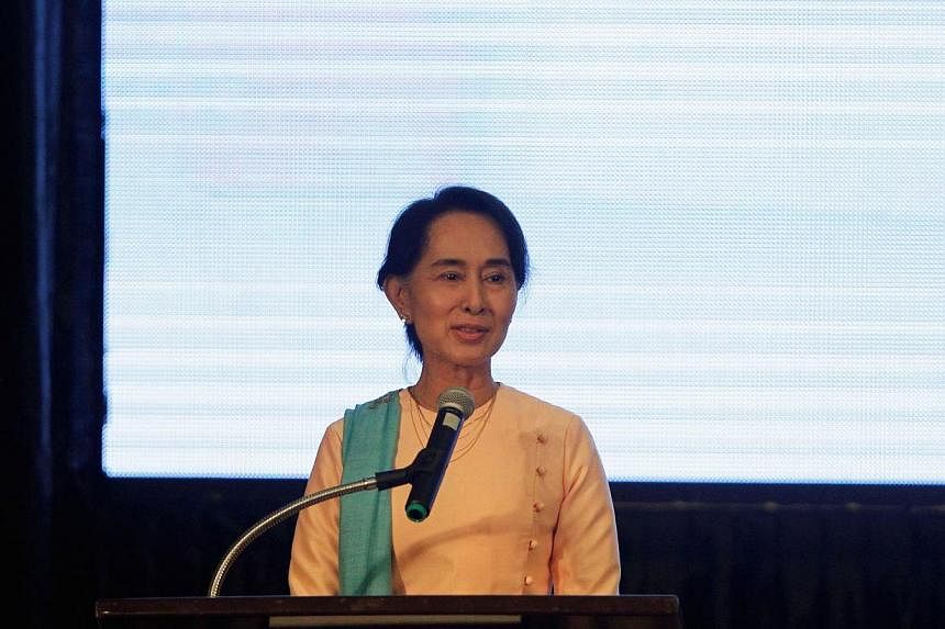 Myanmar opposition leader Aung San Suu Kyi speaks at the launch event for the State of the Tropics report, at Kandawgyi palace hotel in Yangon on June 29, 2014. Ms Suu Kyi is stepping up efforts to change a Constitution that bars her from the preside