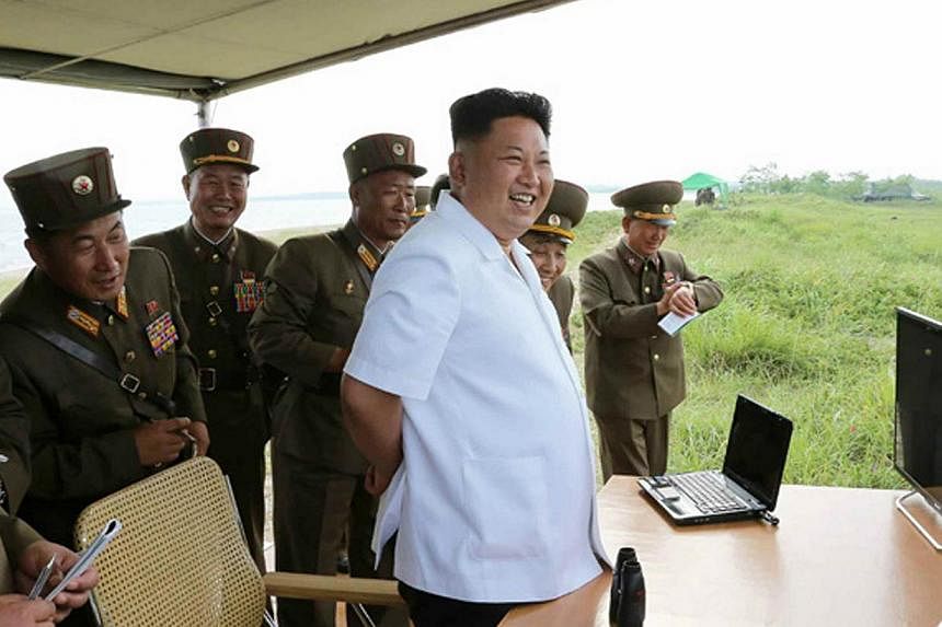 This undated picture released from North Korea's official Korean Central News Agency (KCNA) on June 27, 2014 shows Kim Jong Un inspecting the test firing of a missile at an undisclosed place in North Korea. North Korea confirmed on Monday its second 
