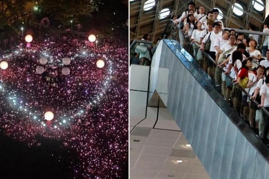 The annual Pink Dot event at Hong Lim Park on June 28, 2014, and Faith Community Baptist Church goers wearing white on June 29, 2014. --&nbsp;&nbsp;PHOTOS: AFP/LAU FOOK KONG