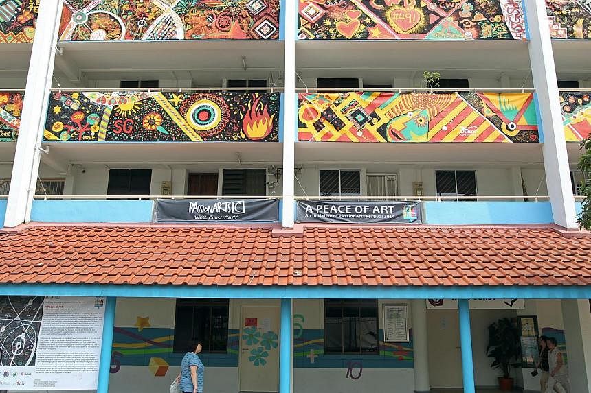 Some 400 residents in the West Coast community created the largest canvas art installation on a HDB block in Singapore.&nbsp;400 residents from the West Coast constituency set a record yesterday for the largest art installation to be displayed on the
