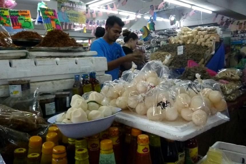 Turtle eggs are openly sold in a bazaar at Kuala Terengganu, the capital city of the state of Terengganu. There is no outright ban on the consumption of turtle eggs in Peninsular Malaysia, unlike the case in Sabah and Sarawak. -- ST PHOTO: CHEONG POH