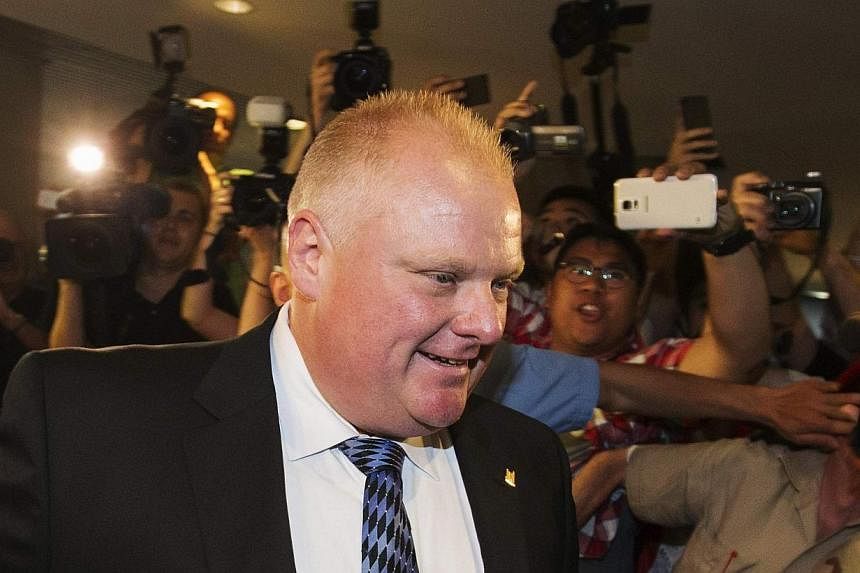 Toronto Mayor Rob Ford arrives at City Hall in Toronto on June 30, 2014.&nbsp;Toronto Mayor Rob Ford admitted on Monday he had been in “complete denial” about his drug and alcohol abuse, but asked voters for another chance as he returned to work 
