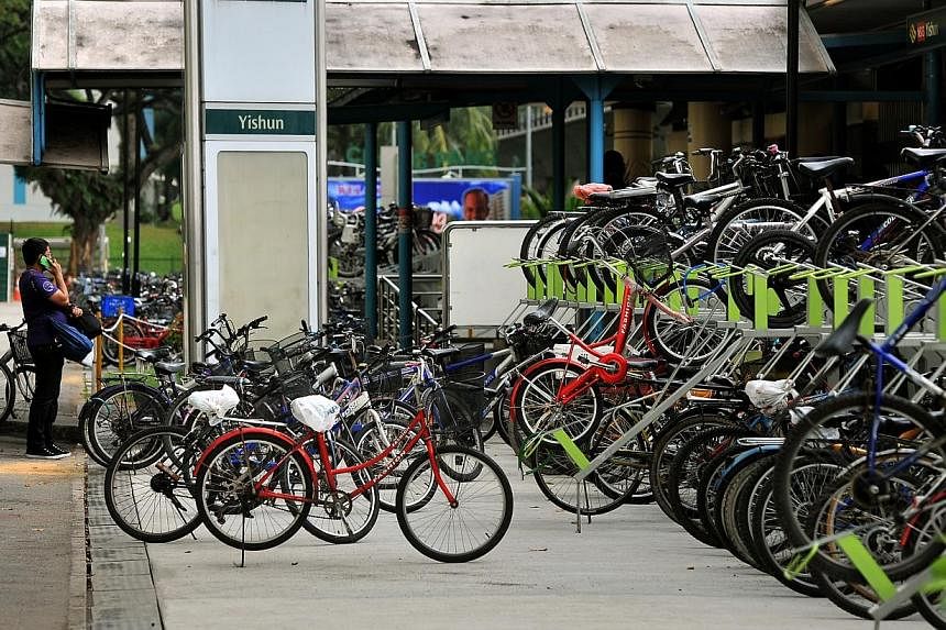 Double-tiered bicycle stands outside Yishun MRT station. -- ST PHOTO:&nbsp;KUA CHEE SIONG
