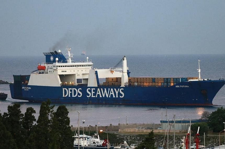 Danish ship Ark Futura arrives in the port of Gioia Tauro, southern Italy, on July 2, 2014 for the transfer of chemical weapons from Syria to be destroyed. -- PHOTO: AFP