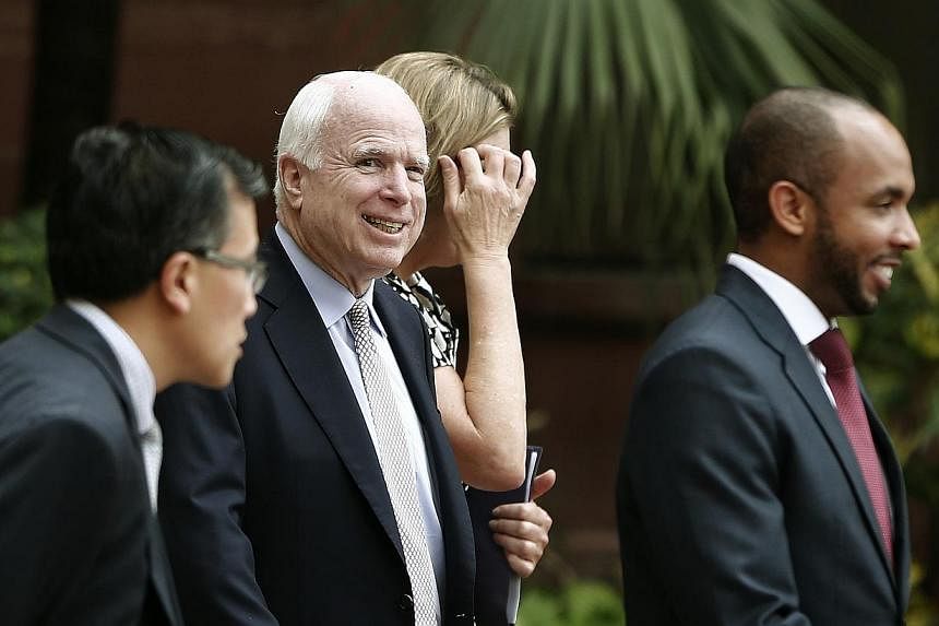 US Senator John McCain (second left) leaves after his meeting with India's Foreign Minister Sushma Swaraj in New Delhi on July 2, 2014. A visit to India by McCain on Wednesday was overshadowed by a row over reports that the National Security Agency w
