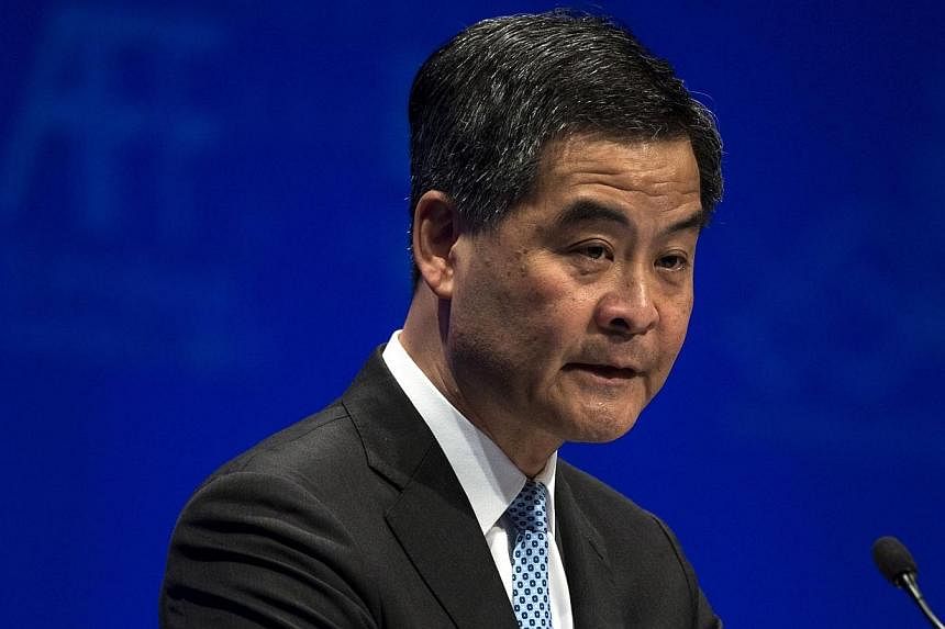 Hong Kong's Chief Executive Leung Chun-ying attends the Asian Financial Forum in Hong Kong in this January 13, 2014 file photo.&nbsp;Hong Kong lawmakers on Thursday pelted Mr Leung with objects including a glass of water, while others shouted and hel