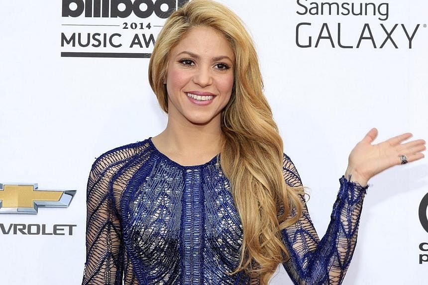 Shakira arrives at the 2014 Billboard Music Awards in Las Vegas, Nevada on May 18, 2014. Shakira will perform before the World Cup final in Rio de Janeiro on July 13, headlining a closing ceremony that includes guitar virtuoso Carlos Santana and rapp