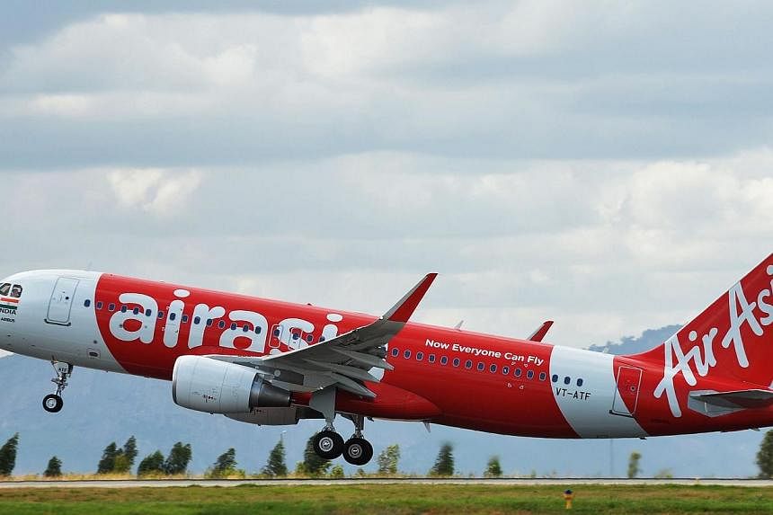 An AirAsia India Airbus A320 takes off as it embarks on the carrier's inaugural domestic flight to Goa from the Kempe Gowda International Airport (KGIA) in Bangalore on June 12, 2014. AirAsia Bhd said on Thursday, July 3, 2014, it expects its India u