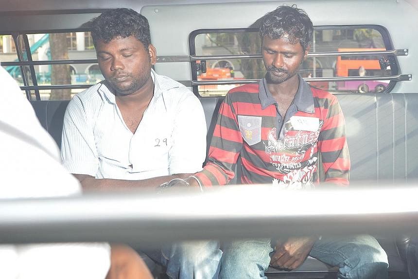 Palanivel Dhasmohan (left) and Karuppaiah Chandrasekar, both Indian nationals, were charged with being part of an unlawful assembly of about 400 people, and of throwing pieces of hardened cement at police officers. -- PHOTO: ST FILE