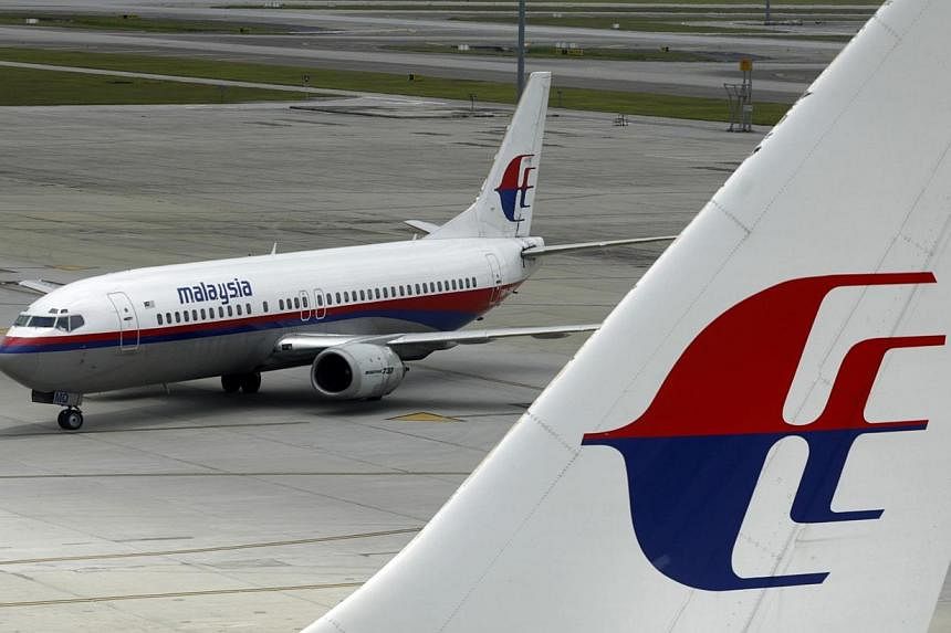 An aircraft of Malaysian Airline System taxis on the tarmac at Kuala Lumpur International Airport in Sepang in this Feb 26, 2007 file photo.&nbsp;Shares of Malaysian Airline System (MAS) rose 9.52 per cent after Reuters reported that state investor K
