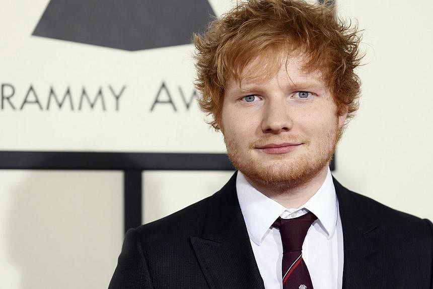 Singer Ed Sheeran arrives at the 56th annual Grammy Awards in Los Angeles, California in this Jan 26, 2014, file photo.&nbsp;British singer-songwriter Ed Sheeran scored his first top album on the weekly US Billboard 200 chart on Wednesday as "x" easi
