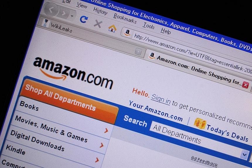 The European Union is looking to add online shopping giant Amazon to a wide-ranging probe into preferential tax deals offered to multinationals by three member states, a report said on Friday, July 4, 2014. -- PHOTO: AFP