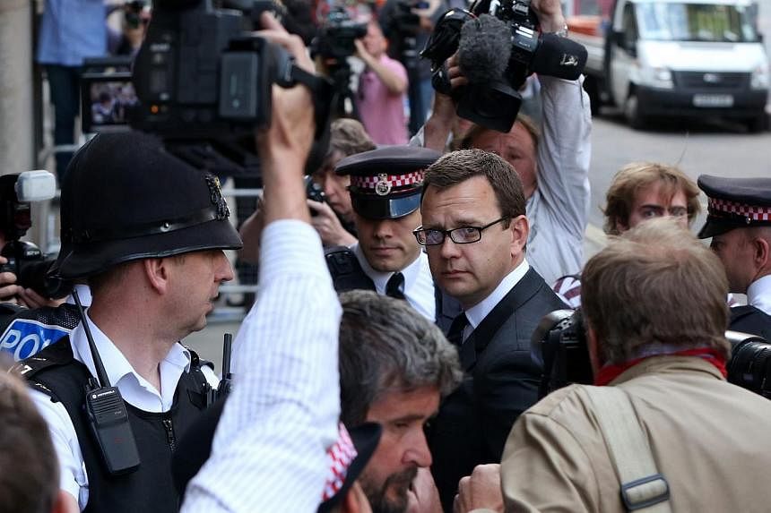 Former Editor of the News of the World Andy Coulson arrives for sentencing at the Old Bailey court house in London on July 4, 2014.&nbsp;Andy Coulson, a former top aide to British Prime Minister David Cameron, was jailed for 18 months on Friday, July