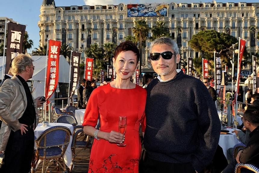 Film director Tsui Hark (right) and his producer wife Nansun Shi at Cannes 2011. -- PHOTO:&nbsp;CELESTIAL MOVIES
