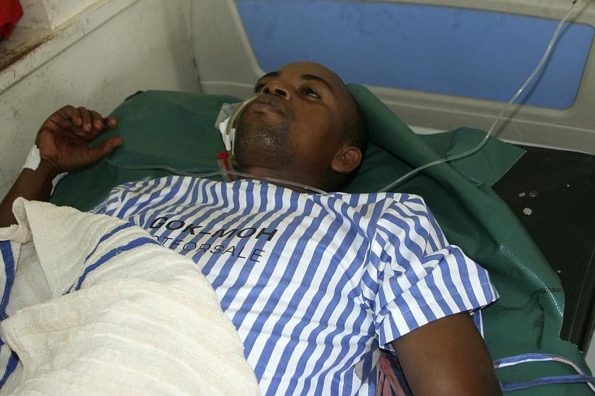 A resident receives treatment at the King Fahad hospital after he was shot when gunmen attacked Hindi village, near Kenya's coastal town of Lamu, July 6, 2014.&nbsp;Gunmen killed at least 29 people in raids on two separate areas on the Kenyan coast, 