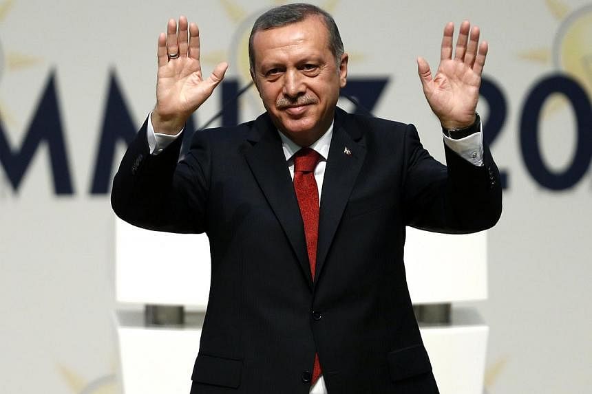 Turkish Prime Minister Recep Tayyip Erdogan kicked off his presidential campaign on Saturday by promising to transform the role into a more powerful position if he wins the August polls. -- PHOTO: REUTERS