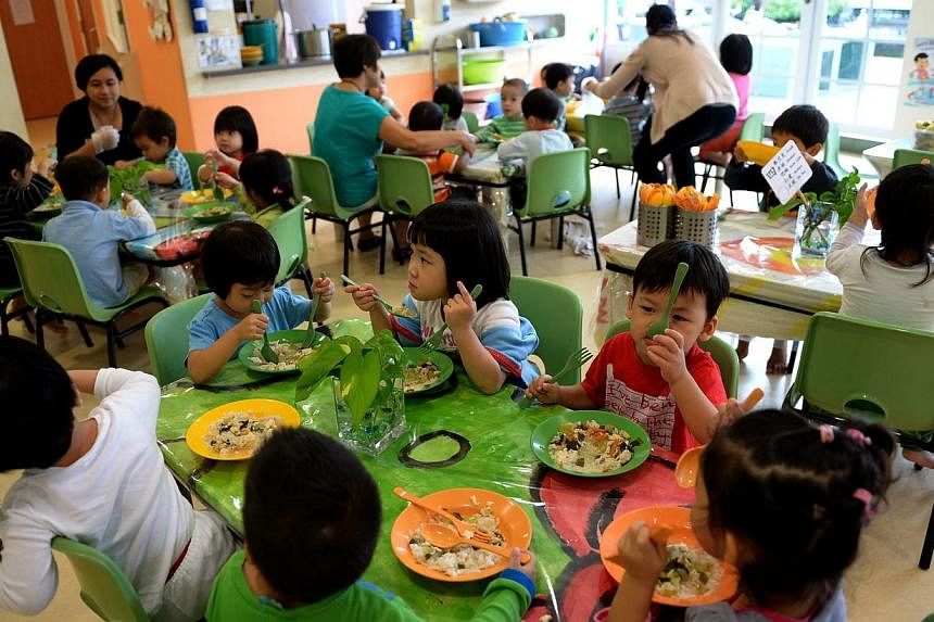 These three-year-old preschoolers at The Caterpillar's Cove, Child Development and Study Centre are given opportunities to practice social interation skills during their meal times.&nbsp;A suggestion by an opposition member to do away with a requirem
