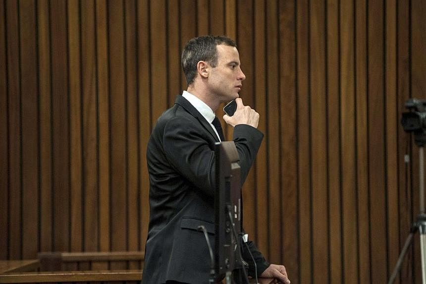 Olympic and Paralympic track star Oscar Pistorius looks on during his trial, at the North Gauteng High Court in Pretoria July 7, 2014.&nbsp;South African prosecutors on Monday sought to show Oscar Pistorius's sports doctor overstated his immobility w