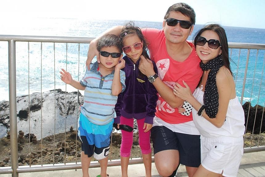 Her husband Lim Teck Wee (left, with their children in Hawaii two years ago).