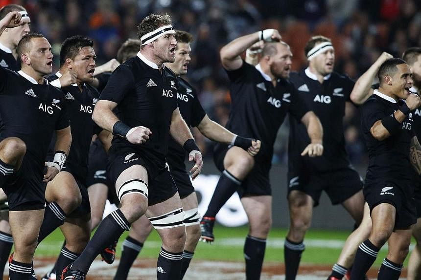 New Zealand's All Blacks perform the "haka" before the kick off of their final rugby union test match against England at Waikato Stadium in Hamilton on June 21, 2014.&nbsp;The world-famous 'Haka' war cry will be heard in Singapore in November when th