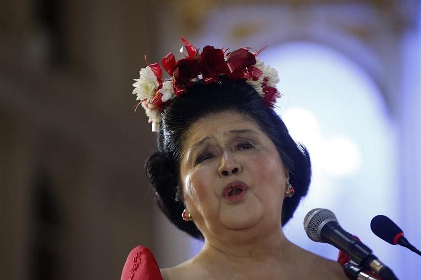 Former Philippine first lady and Congresswoman Imelda Marcos speaks to her supporters after attending a mass during her 85th birthday celebration, in Batac, Ilocos Norte in northern Philippines, on July 2, 2014.&nbsp;A leading Catholic university in 