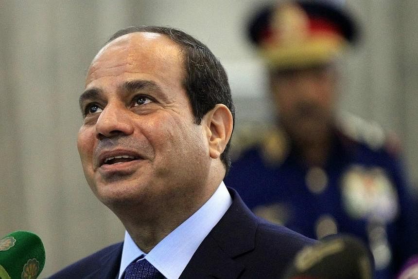 Egypt's President Abdel Fattah al-Sisi speaks during a joint news conference with Sudan's President Omar al-Bashir (not seen) in Khartoum June 27, 2014.&nbsp;Egypt’s President Abdel Fattah al-Sisi said on Sunday he “wished” three jailed Al-Jaze