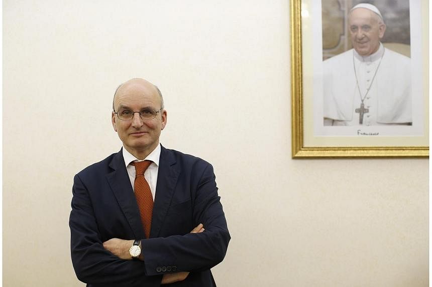 President of the Vatican bank Ernst von Freyberg poses in his office at the Vatican on June 10, 2013.&nbsp;The Vatican bank, dogged by scandal and allegations of money laundering, has paid a colossal price for cleaning up its accounts, its 2013 finan