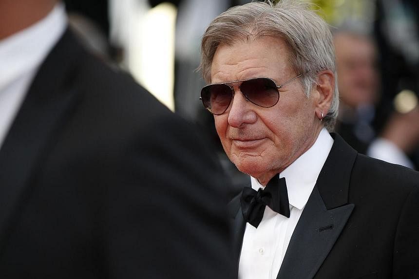 Member of the cast of "The Expendables 3", US actor Harrison Ford poses on the red carpet during the 67th edition of the Cannes Film Festival in Cannes, southern France, on May 18, 2014.&nbsp;Actor Harrison Ford is recuperating from surgery after bre