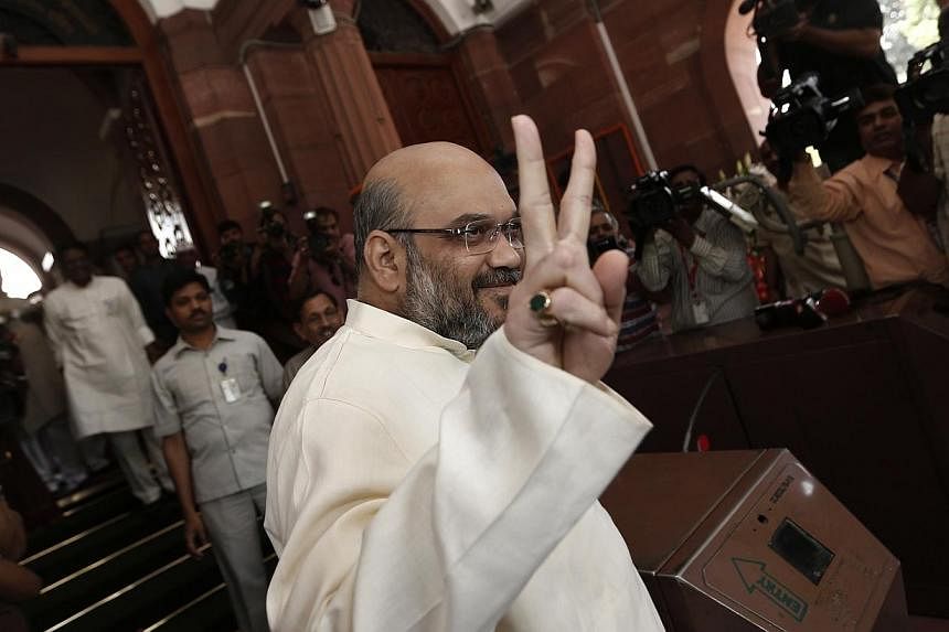 Amit Shah, a leader of Bharatiya Janata Party (BJP) gestures as he arrives to attend the BJP parliamentary party meeting at parliament house in New Delhi May 20, 2014.&nbsp;Indian Prime Minister Narendra Modi tightened his grip on the reins of power 