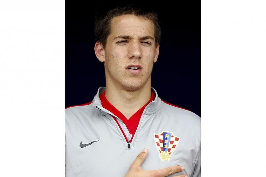 In this file picture taken on May 31, 2014, Croatia's midfielder Mario Pasalic listens to the national anthem before the start of the 2014 World Cup international friendly football match against Mali in Osijek.&nbsp;Chelsea signed Pasalic from Hajduk