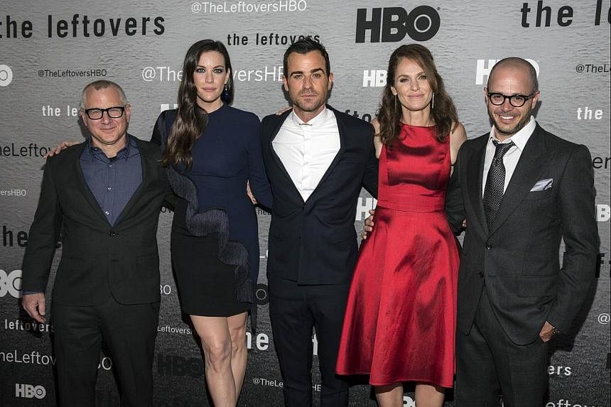 The Leftovers creator Tom Perrotta (left) with actors Liv Tyler, Justin Theroux, Amy Brenneman and co-creator Damon Lindelof. -- PHOTO: REUTERS