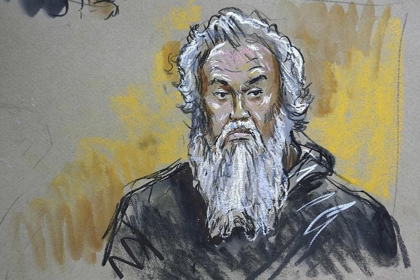 Benghazi attack suspect Ahmed Abu Khatallah is pictured in U.S. federal court in Washington, in this courtroom sketch drawn and released on June 28, 2014.&nbsp;A US judge on Tuesday postponed until September the next hearing for the suspected ringlea