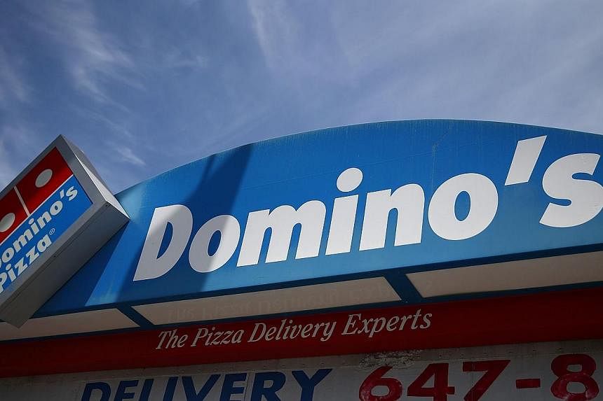 A Domino's Pizza restaurant in San Francisco, California. A pilot of a US flight bought pizza for all 160 passengers and crew to make up for a delay.&nbsp;-- PHOTO: AFP
