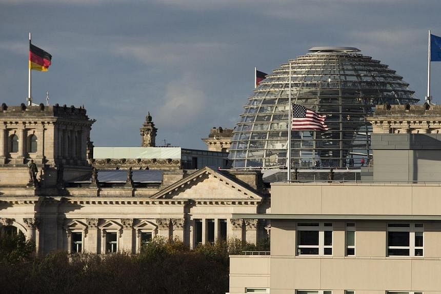 This photo taken on Oct 29, 2013 shows a view of the US embassy in front of Berlin's Parliament building (the Reichstag).&nbsp;Germany has expelled the US intelligence station chief in Berlin Thursday, July 10, 2014, over alleged spying by Washington