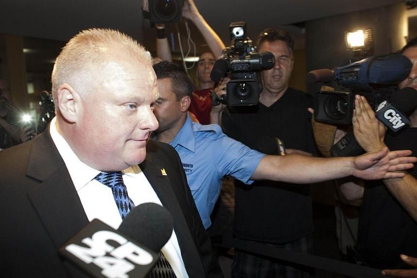Toronto Mayor Rob Ford leaves his office at city hall on his first day back to work after taking part in a rehab program on June 30, 2014 in Toronto, Ontario, Canada.&nbsp;Crack-smoking Toronto Mayor Rob Ford was verbally abusive and scuffled with fe
