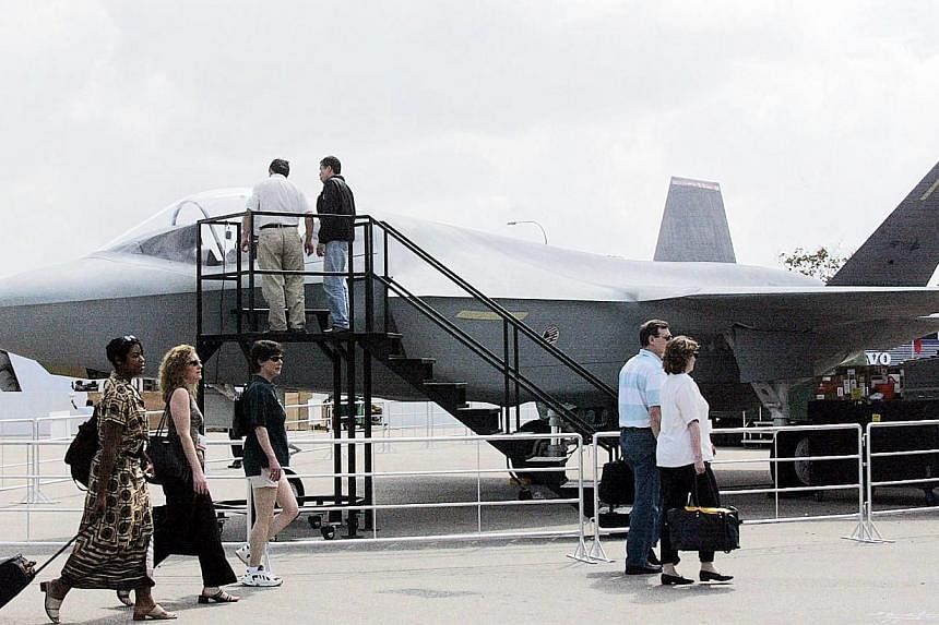This Feb 24, 2002 file photo shows the US F-35 jet fighter on display in front of the exhibition hall for the 11th Asian Aerospace exhibition in Singapore. US Defence Secretary Chuck Hagel told military fliers on Thursday that the stealthy F-35 attac