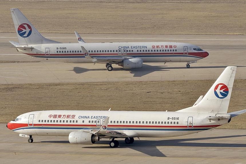 China Eastern Airlines Boeing 737-800 planes are seen at an airport in Taiyuan, Shanxi province on April 6, 2014.&nbsp;As China's aviation market booms, local aircraft leasing companies are raising funds in finance hubs like Hong Kong and Singapore i