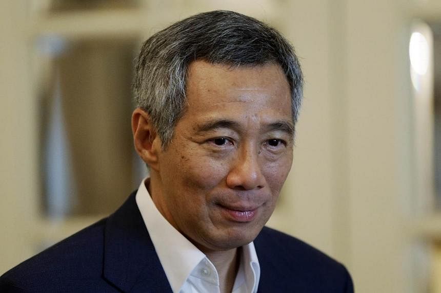 Prime Minister Lee Hsien Loong has made an application for the High Court to rule in his favour in his defamation suit against blogger Roy Ngerng, without going through a full trial. -- PHOTO: AFP