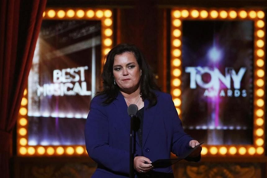 Rosie O'Donnell presents an award during the American Theatre Wing's 68th annual Tony Awards at Radio City Music Hall in New York on June 8, 2014. -- PHOTO: REUTERS