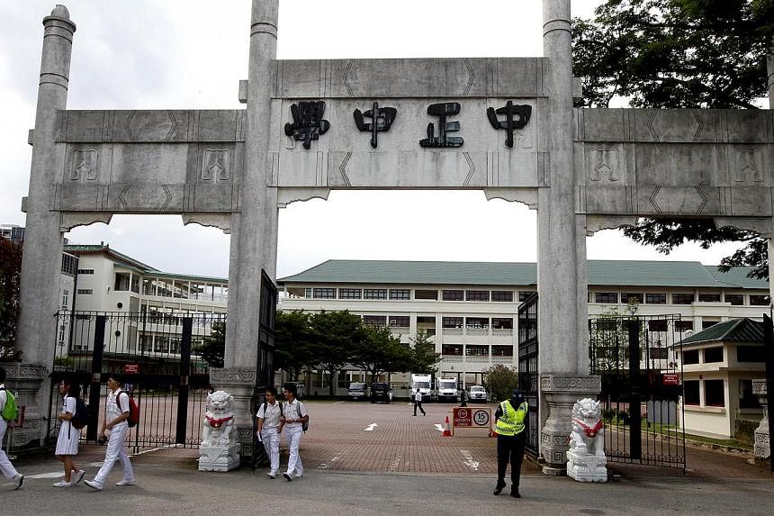 The entrance arch (above) of Chung Cheng High School and its administration building have been gazetted as a combined national monument, joining nine other Singapore school buildings which have been preserved.