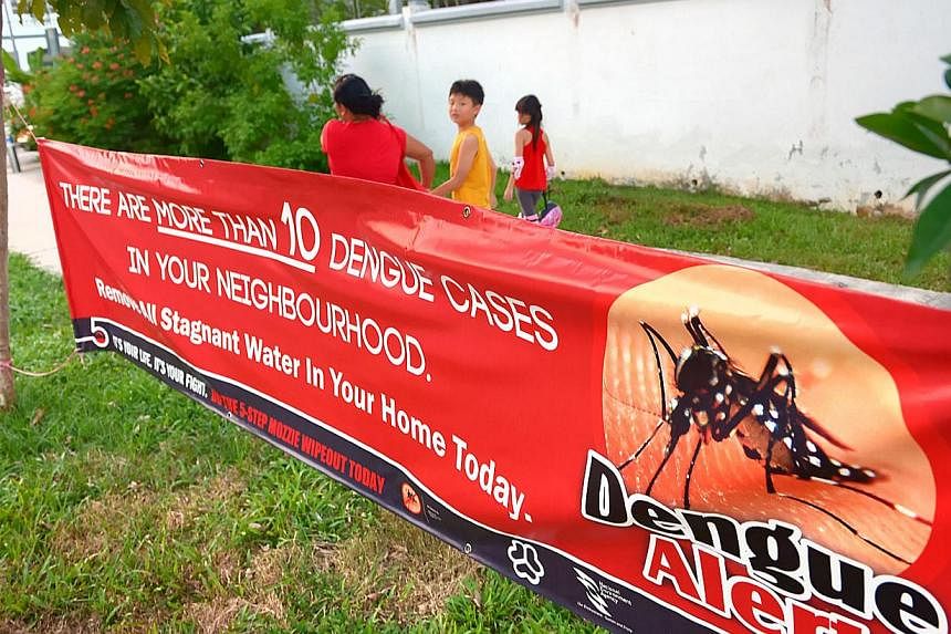 A dengue alert banner in Lorong L, Telok Kurau, which is part of the biggest cluster with 50 infections as of Jan 17, 2013.&nbsp;The world's first dengue vaccine will hit the shelves next year, following the completion of its phase three trials that 