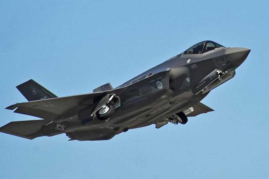 An F-35A Lightning II Joint Strike Fighter takes off on a training sortie at Eglin Air Force Base, Florida on March 6, 2012. -- PHOTO: REUTERS