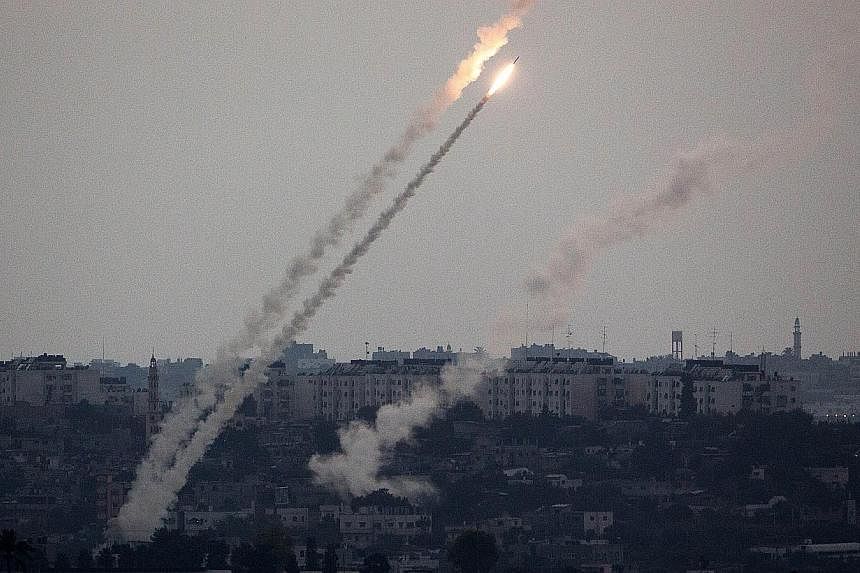 A picture taken from the southern Israeli Gaza border shows a rocket being launched from the Gaza strip into Israel, on July 11, 2014.&nbsp;The United States said on Friday that it was ready to leverage its relationships in the Middle East to try to 