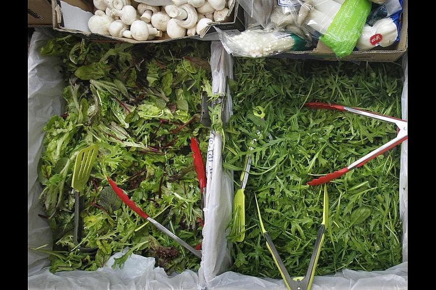 Stalls in Tekka Centre are offering kale, endives and salad leaves (above). -- ST PHOTO: KEVIN LIM