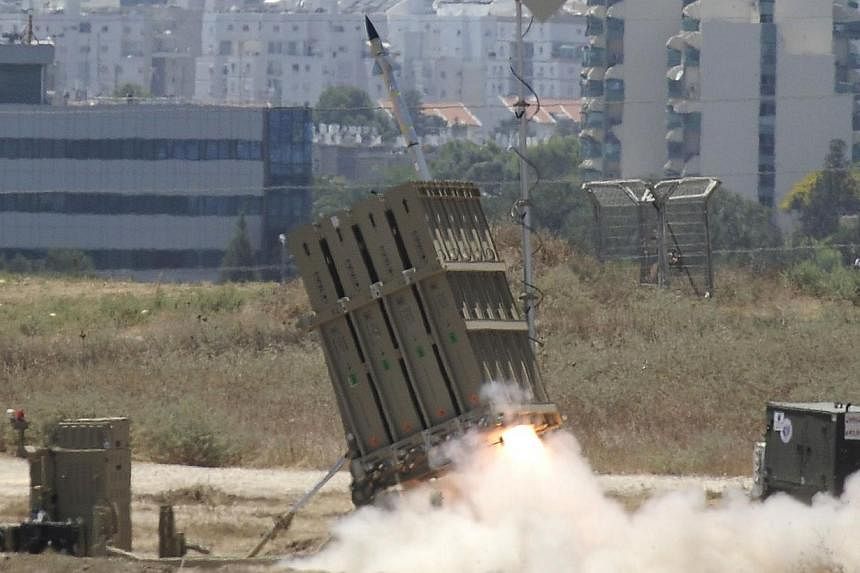 A missile is launched by an "Iron Dome" battery, a short-range missile defence system designed to intercept and destroy incoming short-range rockets and artillery shells, on July 11, 2014, in the southern Israeli city of Ashdod.&nbsp;Two Gaza rockets