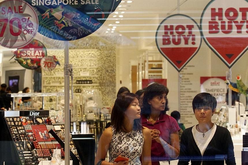 Shoppers at Robinsons Orchard on May 30, 2014, the first day of the Great Singapore Sale (GSS).&nbsp;MasterCard holders spent US$881.5 million ($1.1 billion) in the first month of the Great Singapore Sale from May 30 to June 29. -- PHOTO: ST FILE