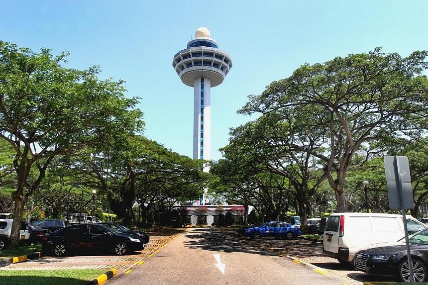 The control tower is seen from the open-air carpark of Terminal One of Changi Airport.&nbsp;Changi Airport has upgraded its Weekend Escapades mobile app to give users more ideas and choices. -- PHOTO: ST FILE