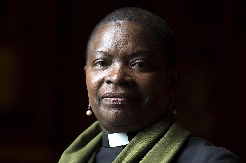 Rose Hudson-Wilkin, chaplain to Queen Elizabeth II and the Speaker of the House of Commons, poses for a photograph during an interview with AFP in London on July 9, 2014.&nbsp;The Church of England could vote to allow female bishops for the first tim