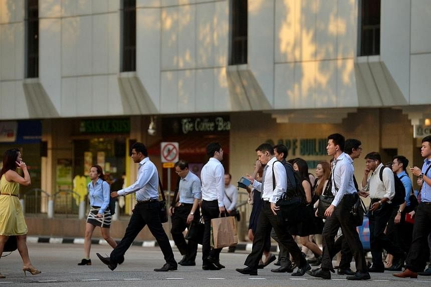 Office workers in the central business district (CBD).&nbsp;A national jobs bank was officially launched on Monday by the Singapore Workforce Development Agency (WDA), listing more than 16,000 positions. -- PHOTO: ST FILE