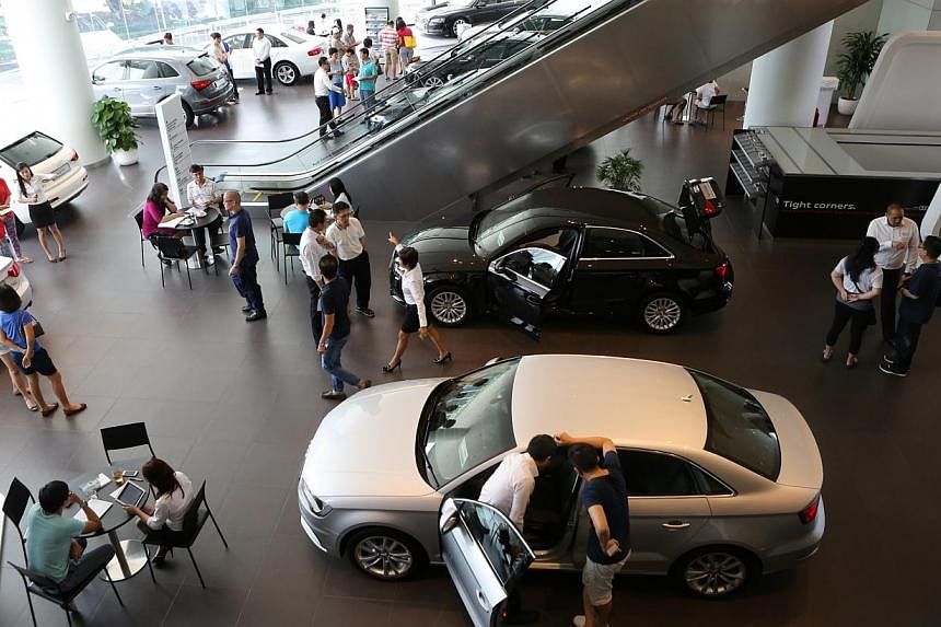 Sales of motor vehicles plummeted 26.8 per cent in May over last year, data released on Tuesday by the Statistics Department showed. -- PHOTO: ST FILE&nbsp;